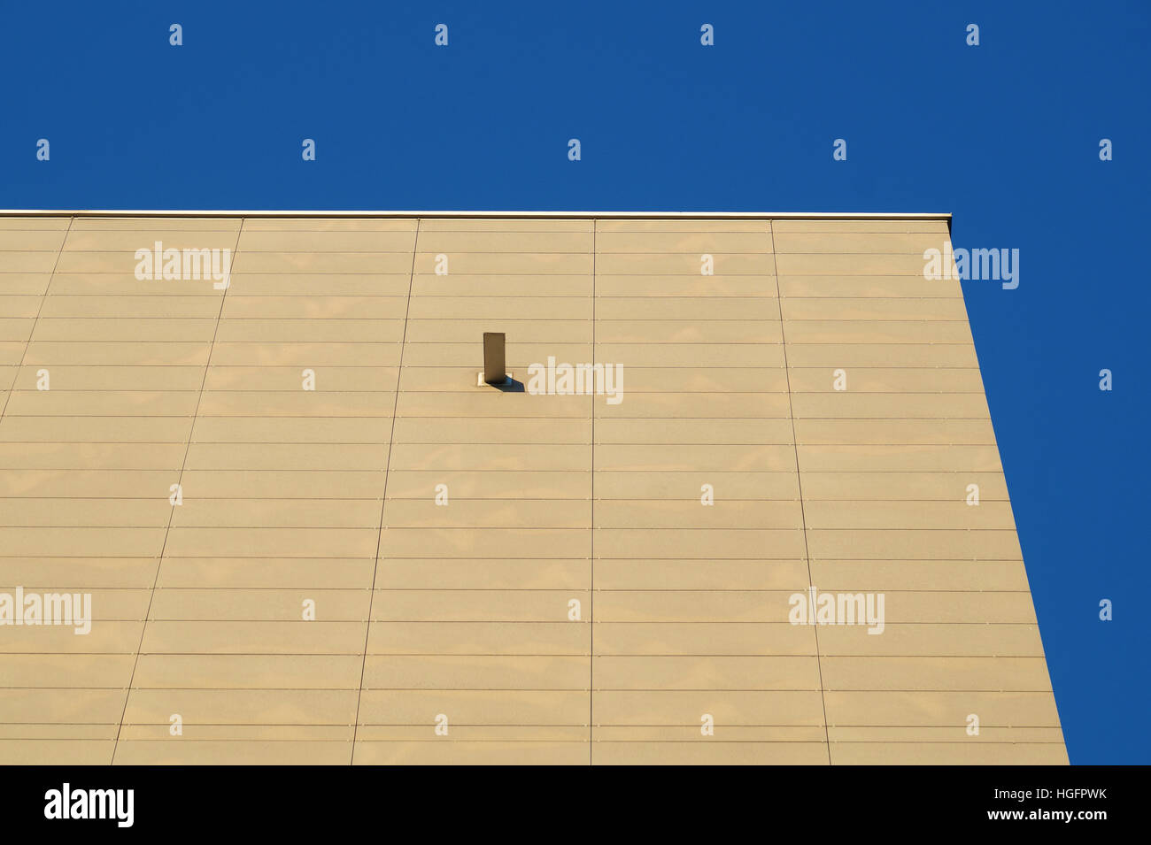 Modern office building against clear blue sky Stock Photo - Alamy