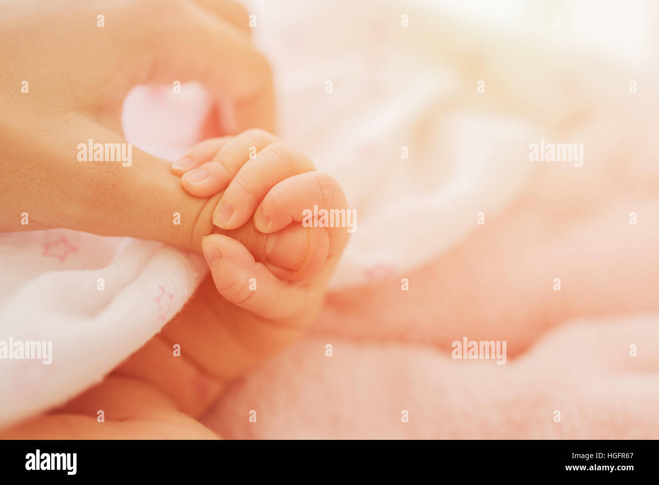 Close up Newborn baby hand Stock Photo