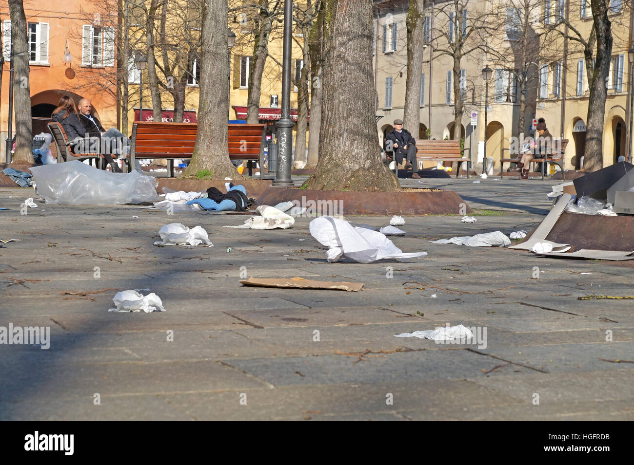 Garbage Cans. Wheelie Bins. Trash Bags. Rubbish scattered out over the