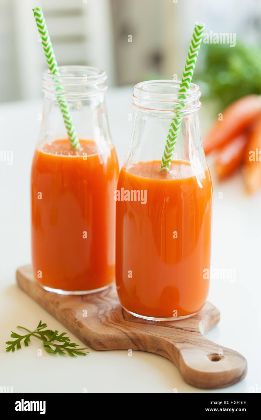 fresh carrot juice and vegetables Stock Photo Alamy