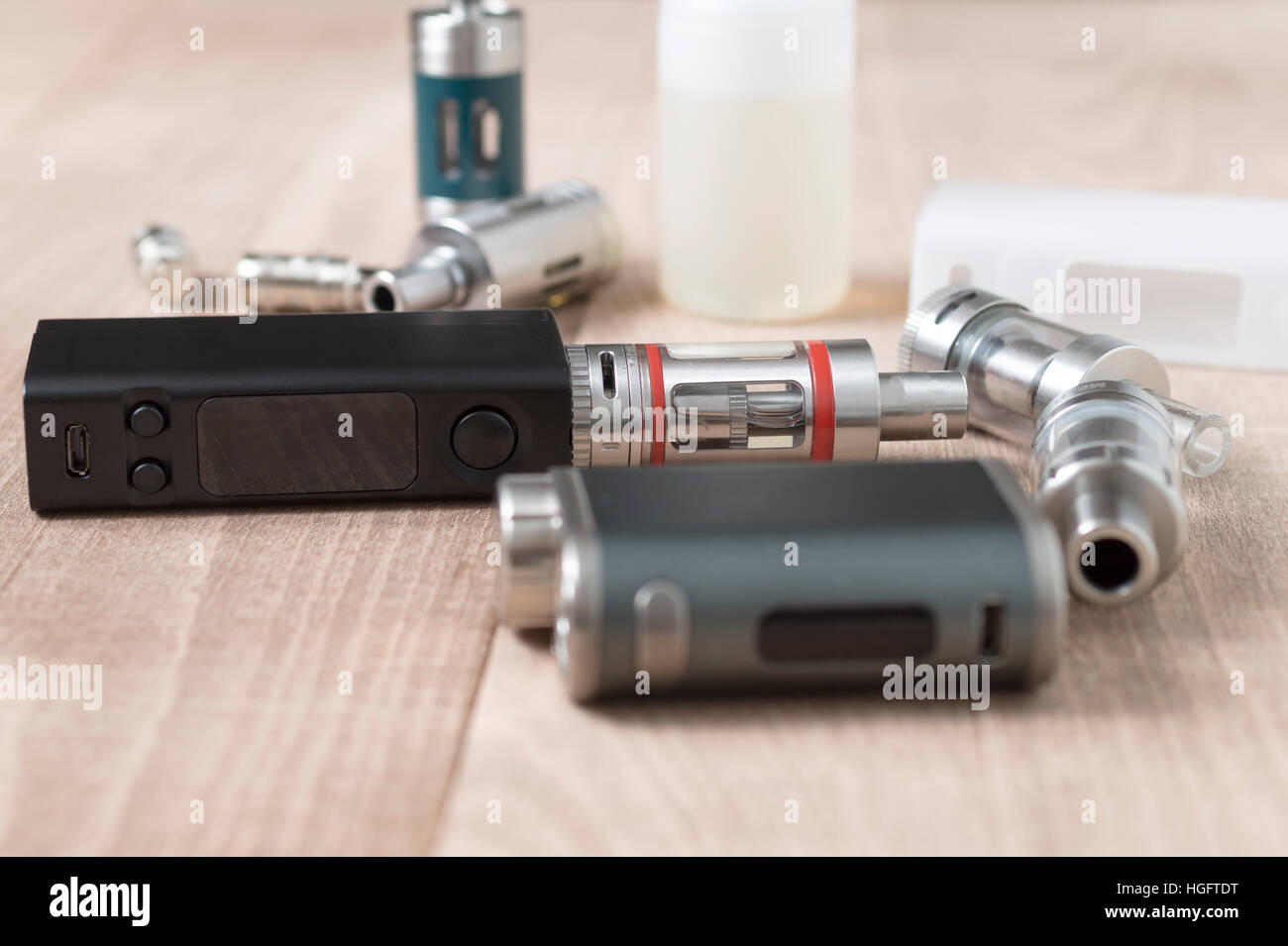 Advanced vaping device, e-cigarette on the table.Close up Stock Photo