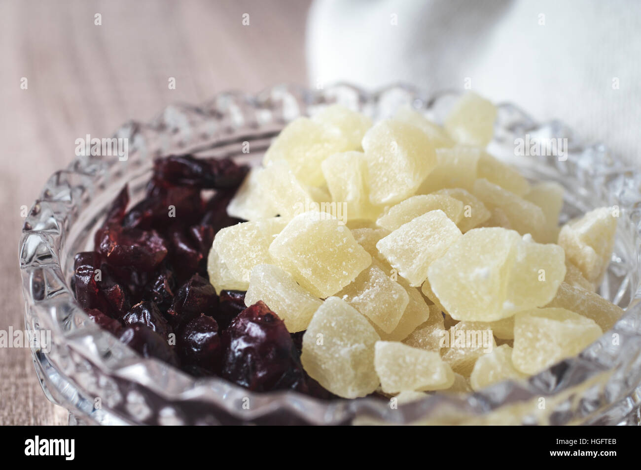 Dried fruits in crystal bowl. Retro colors Stock Photo