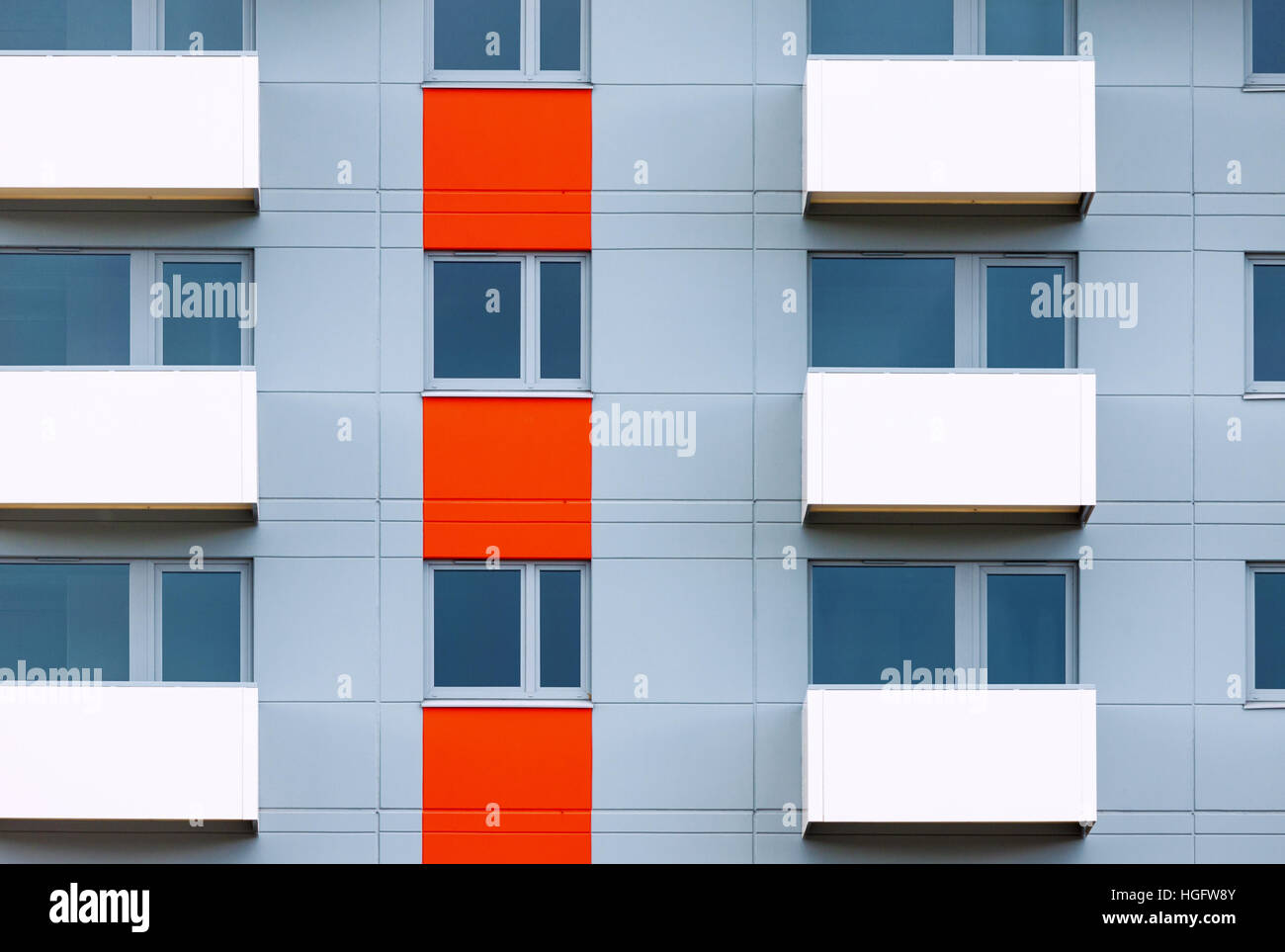 Windows and balconies of new residential building as natural geometrical background Stock Photo