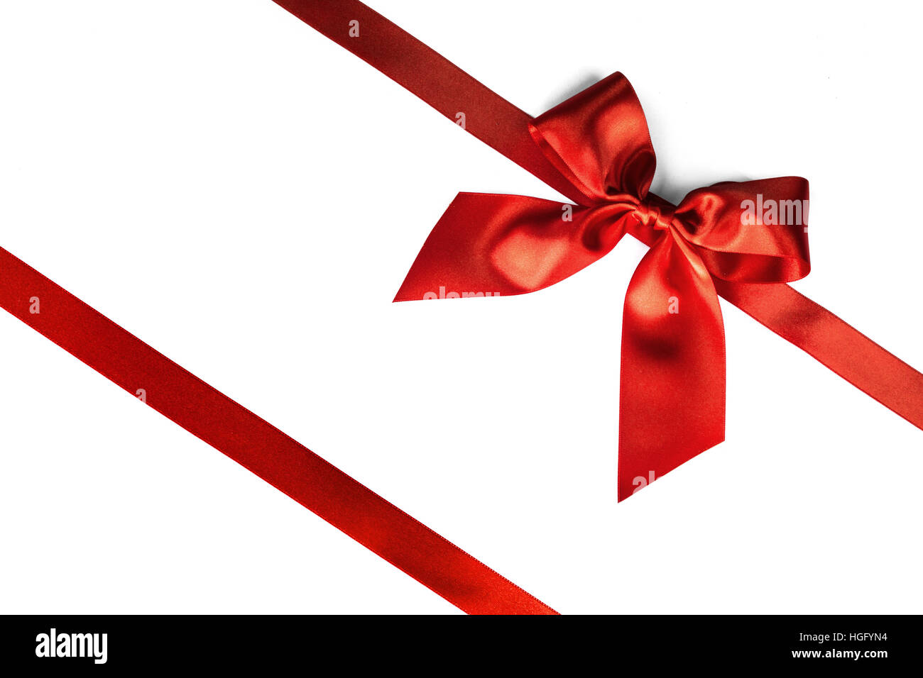 Red ribbon bow isolated on white background Stock Photo - Alamy