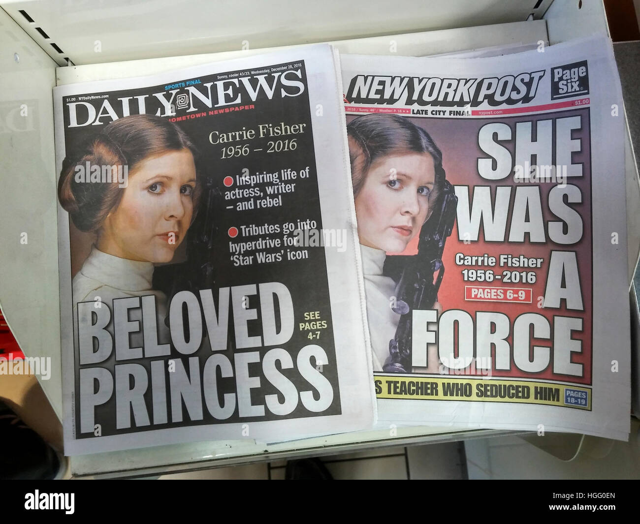 Front pages and headlines of the New York tabloid newspapers on Wednesday, December 28, 2016 report on the previous days' death of Carrie Fisher after suffering a heart attack during a flight on Friday. (© Richard B. Levine) Stock Photo