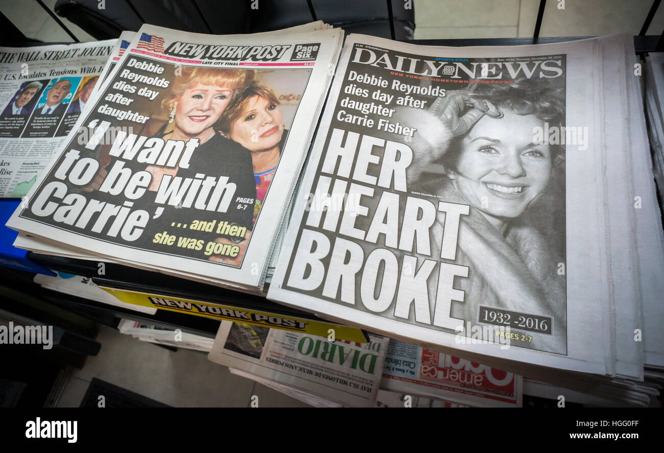 Front pages and headlines of the New York tabloid newspapers on Thursday, December 29, 2016 report on the previous days' death of actress Debbie Reynolds one day after the death of her daughter, Carrie Fisher. (© Richard B. Levine) Stock Photo