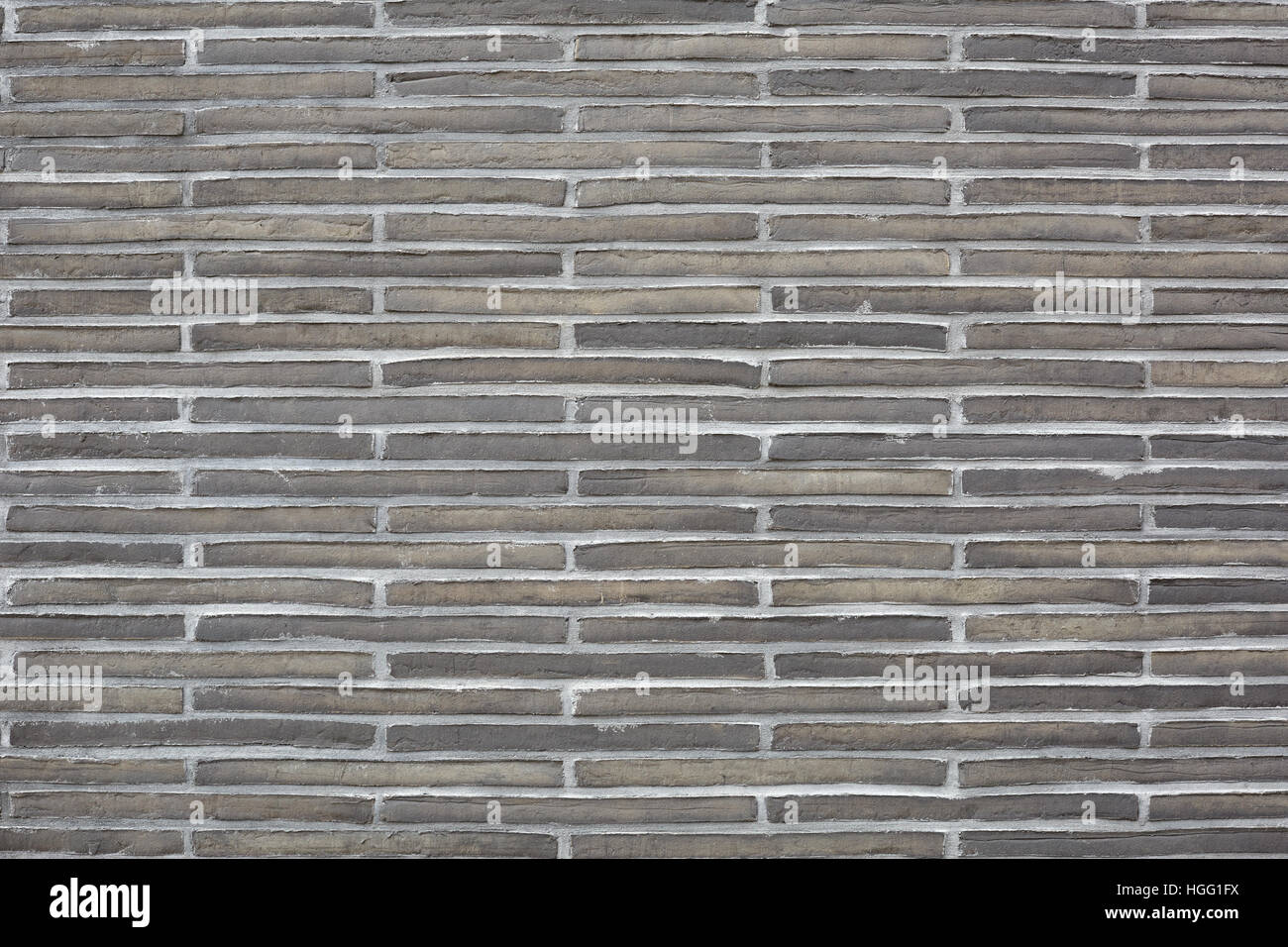 Gray stone bricks wall texture background Stock Photo - Alamy