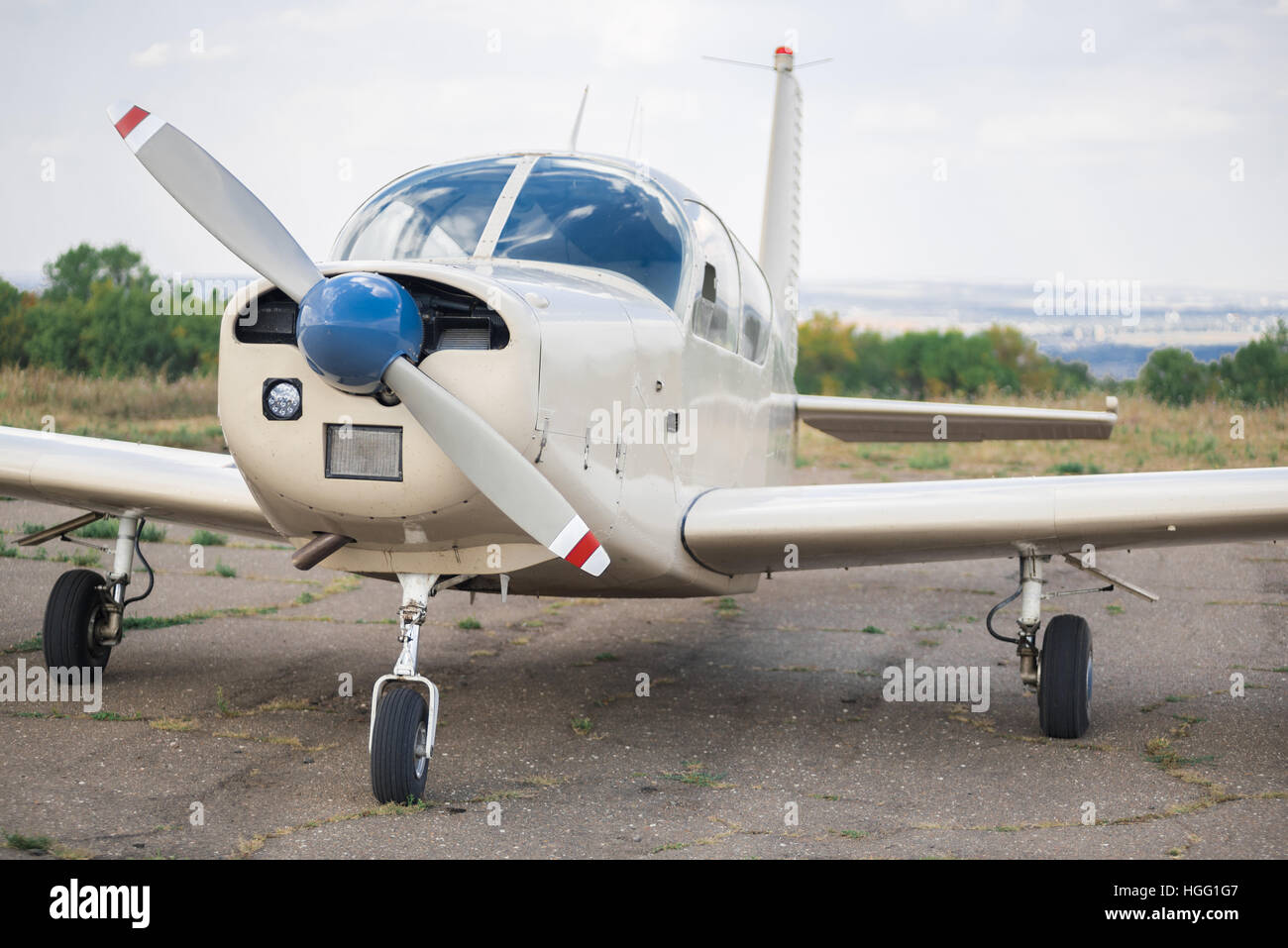 Propeller plane parking at the airport.  Small airplane. Front view. Stock Photo