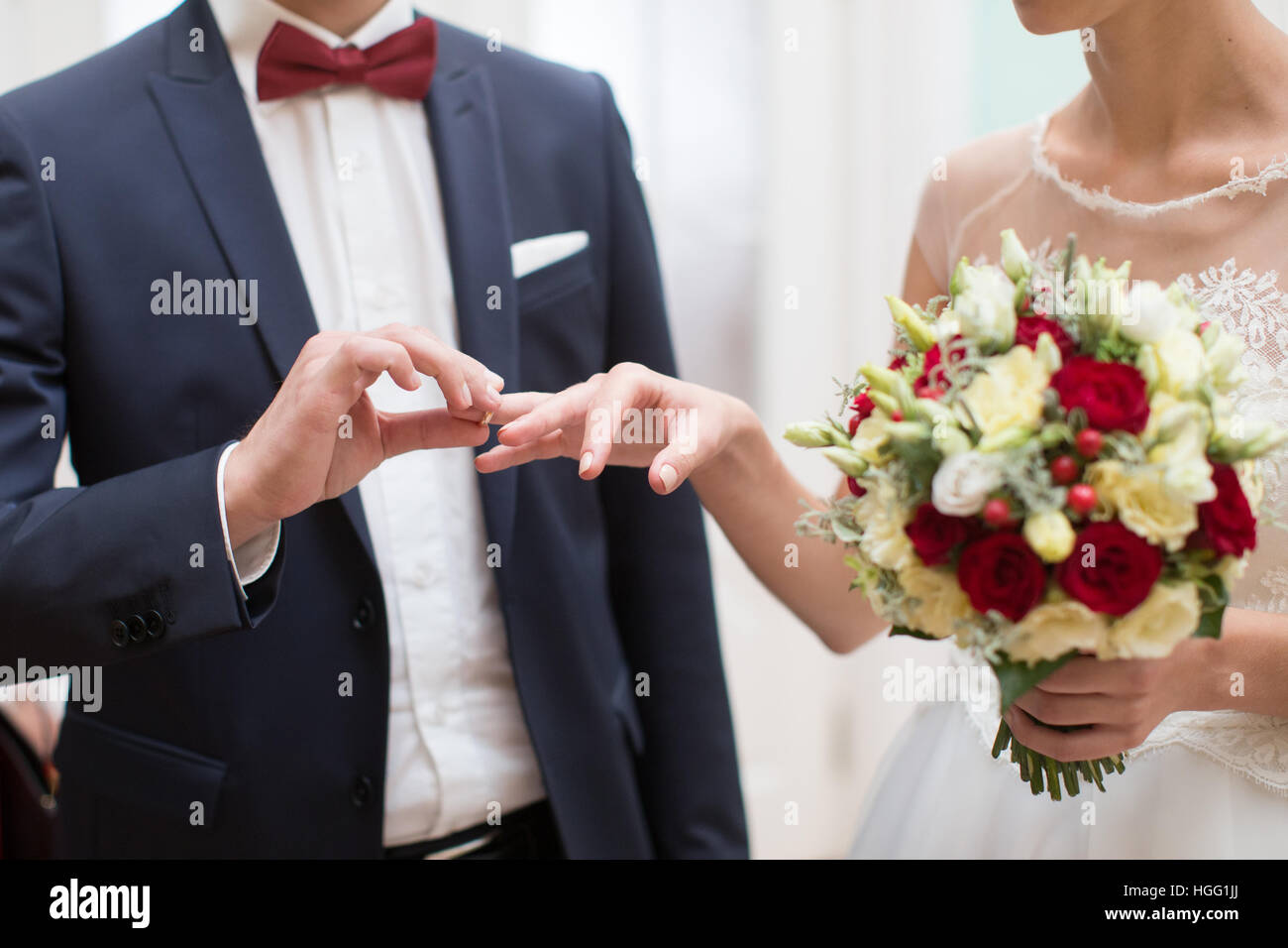 bride and groom are changing rings on wedding ceremony Stock Photo Alamy