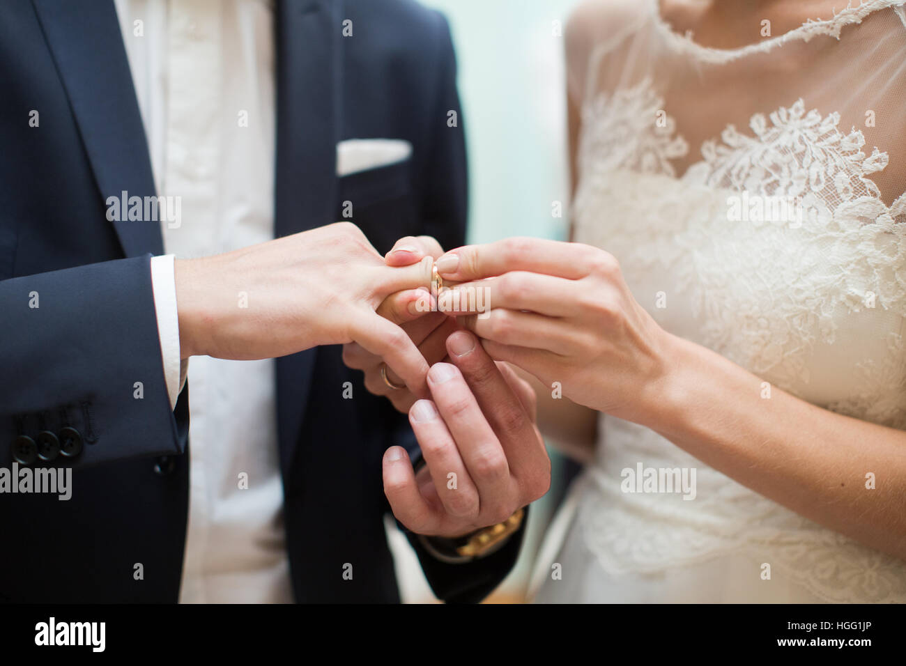 bride and groom are changing rings on wedding ceremony Stock Photo Alamy