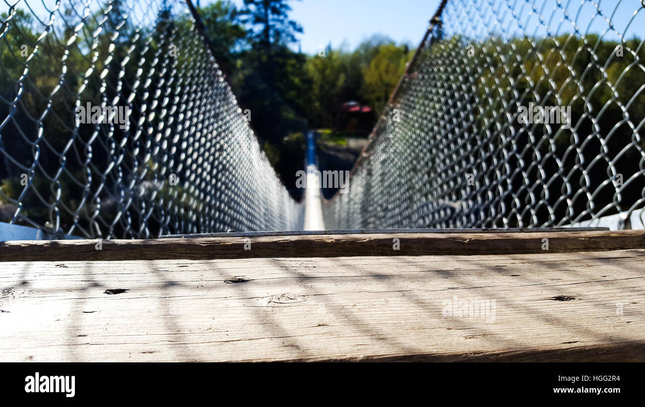 Low angled shot of a hanging bridge Stock Photo - Alamy