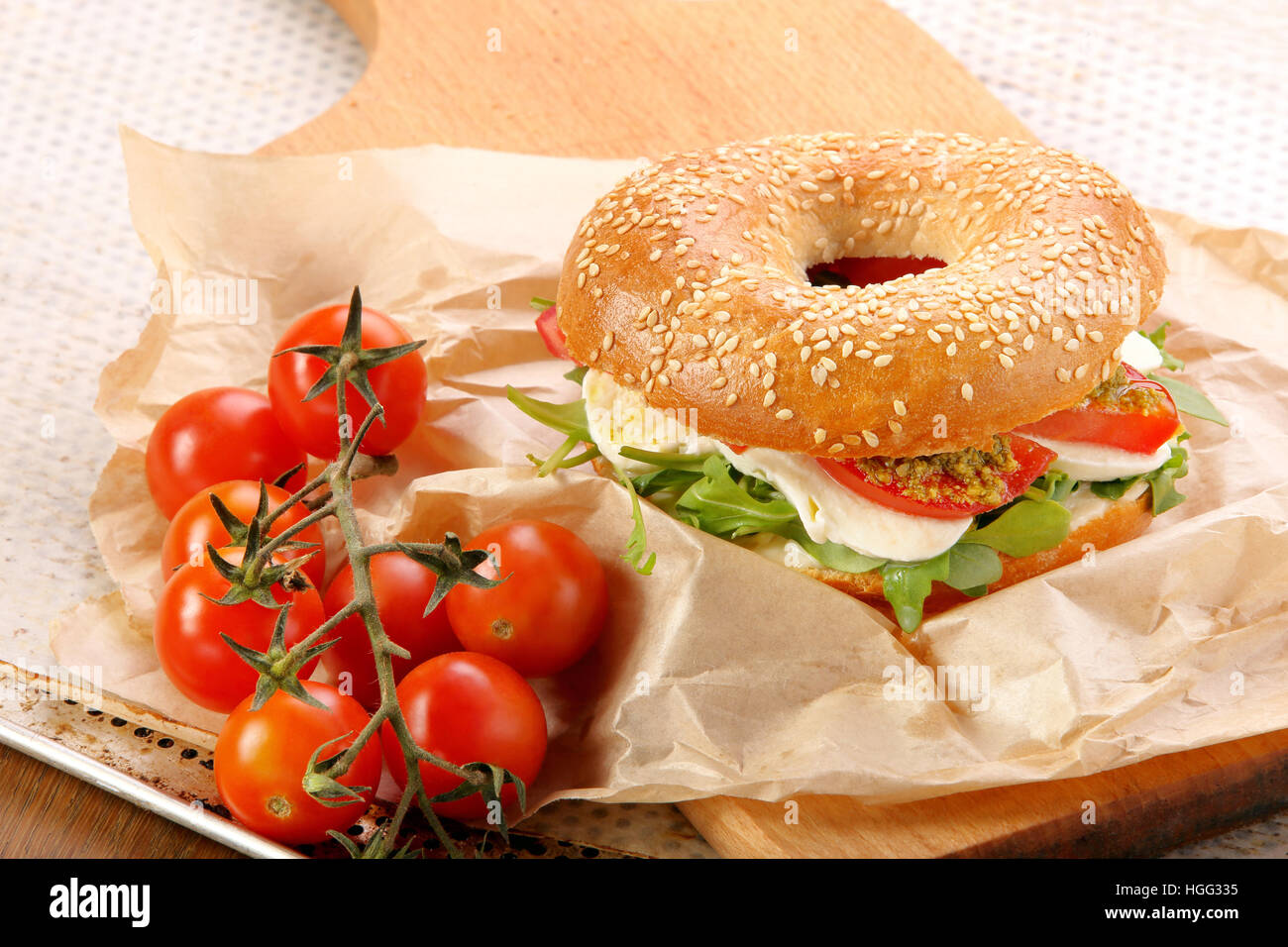 Bagel sandwich with mozzarella, tomato and pesto Stock Photo - Alamy Bagel sandwich with mozzarella, tomato and pesto Stock Photo - Alamy
