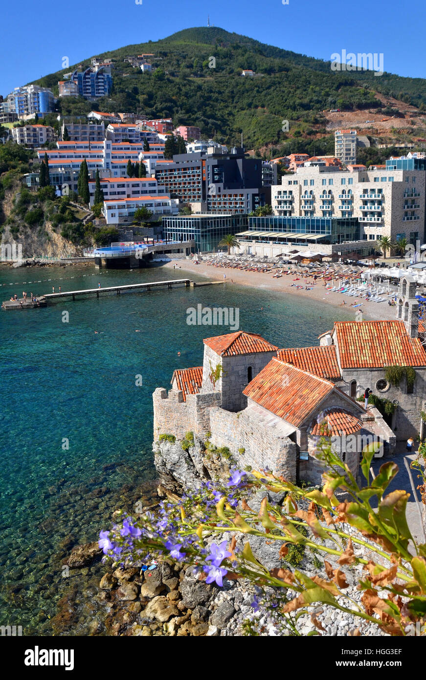 Contrast of old and new buildings of Budva accentuated by the the earthquake in the 1970's Stock Photo