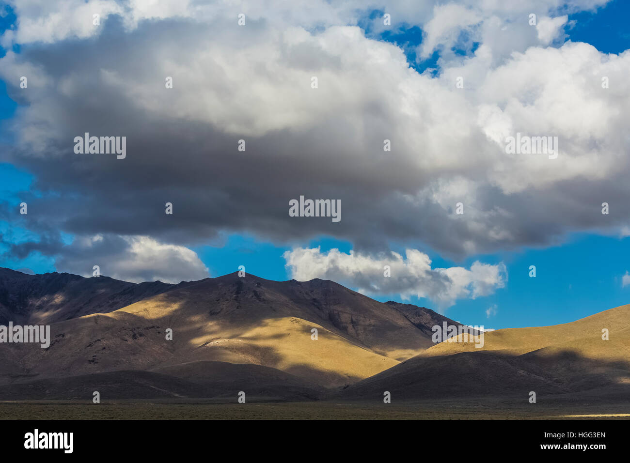 Cloud shadows on the mountains in the basin and range geologic province, Nevada, USA Stock Photo