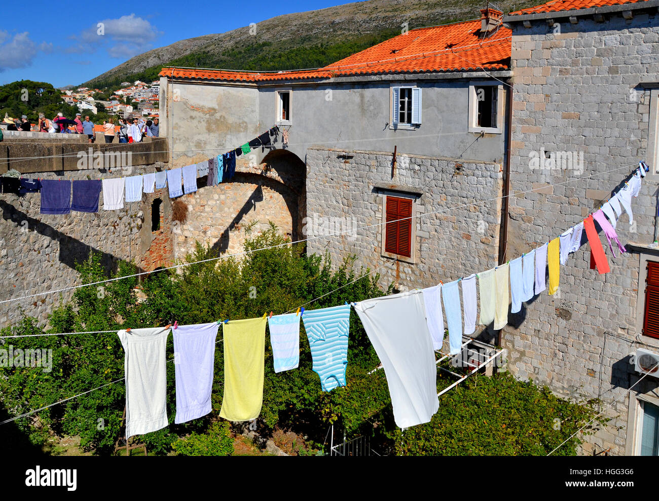 Washed clothes hanging out to dry in the old walled city of Dubrovnik, Croatia. Stock Photo