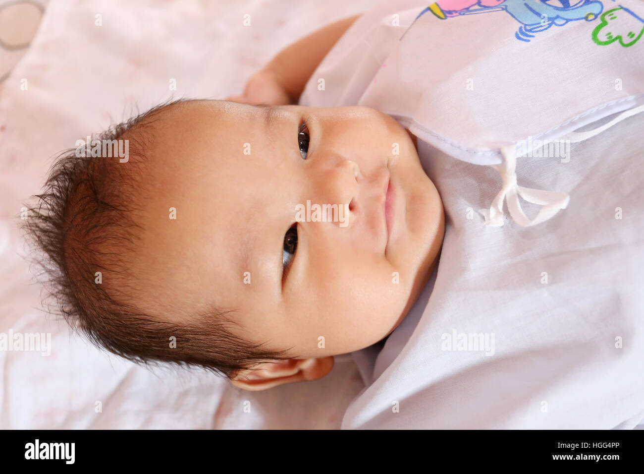 Asian baby smiling happily and good mood,concept of health and growth. Stock Photo