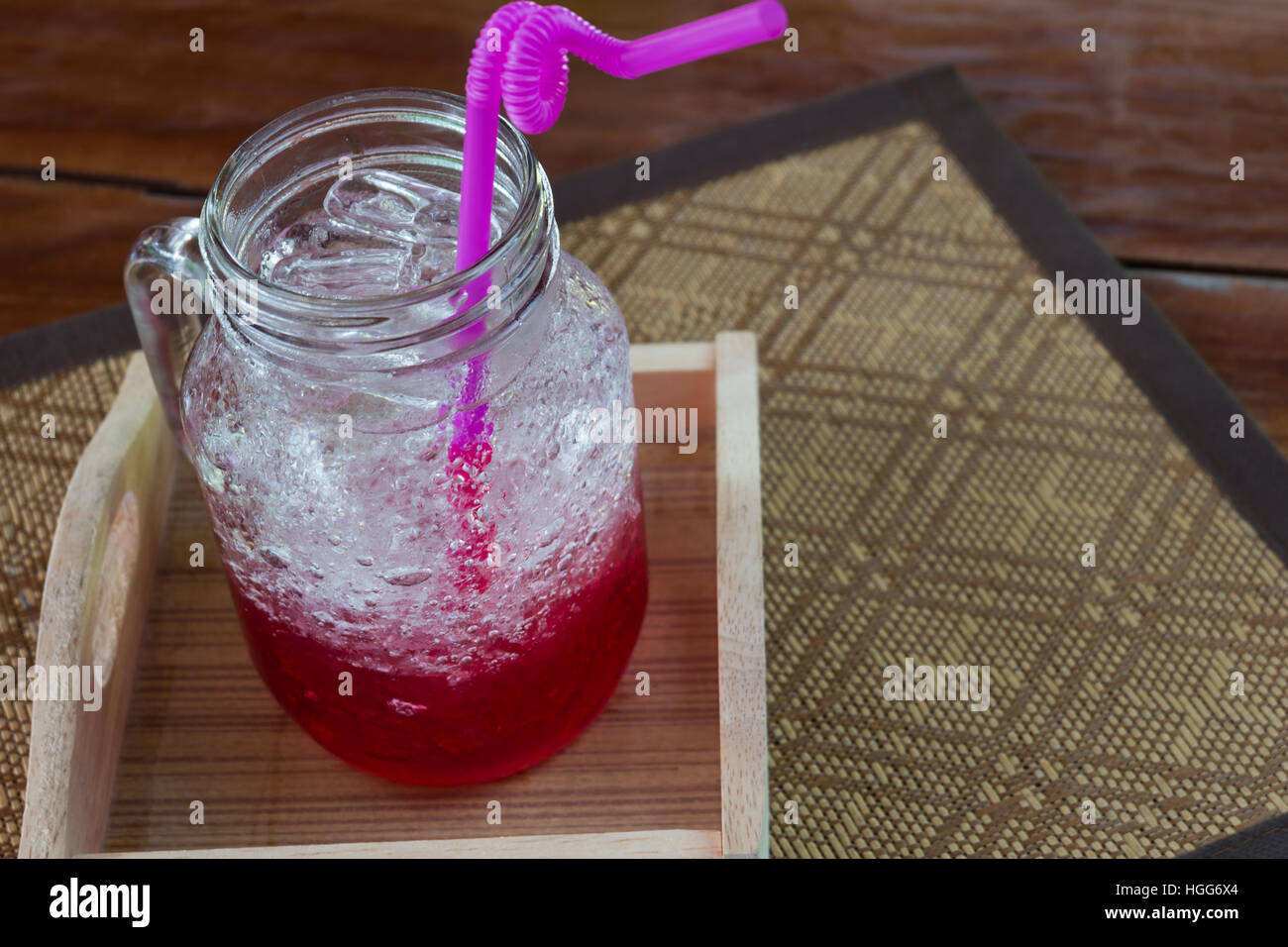 Red water mix soda on table background,process color Stock Photo Alamy