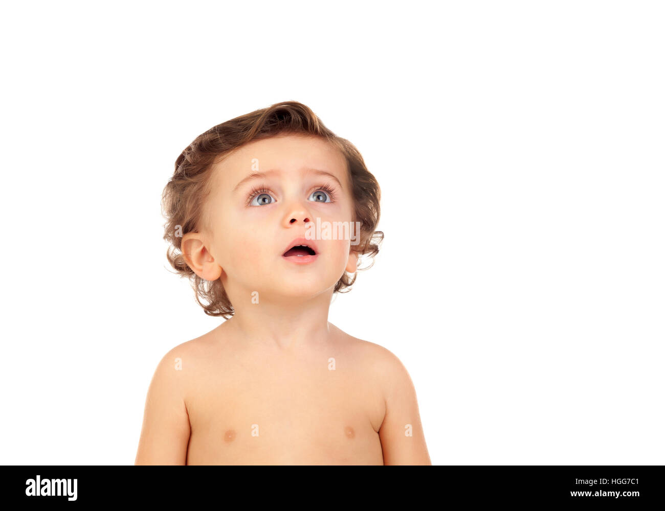 Adorable baby with blue eyes looking up isolated on a white background