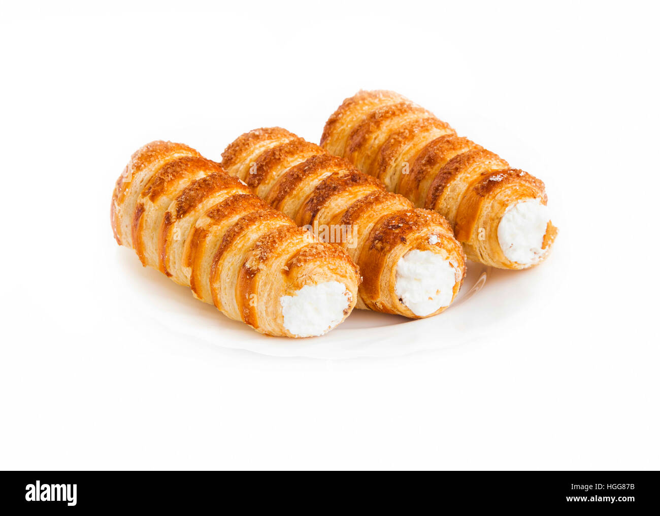 Cream rolls pastry. Horns filled with cream isolated Stock Photo Alamy