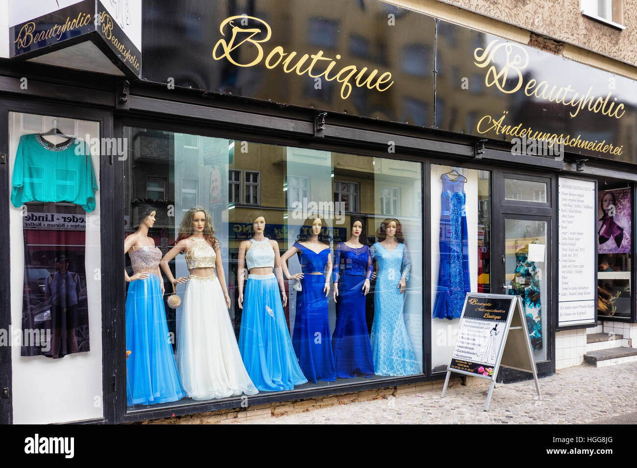 Berlin Neukölln, Karl Marx Strasse. Beautyholic Boutique clothing shop selling evening wear and dresses. Stock Photo