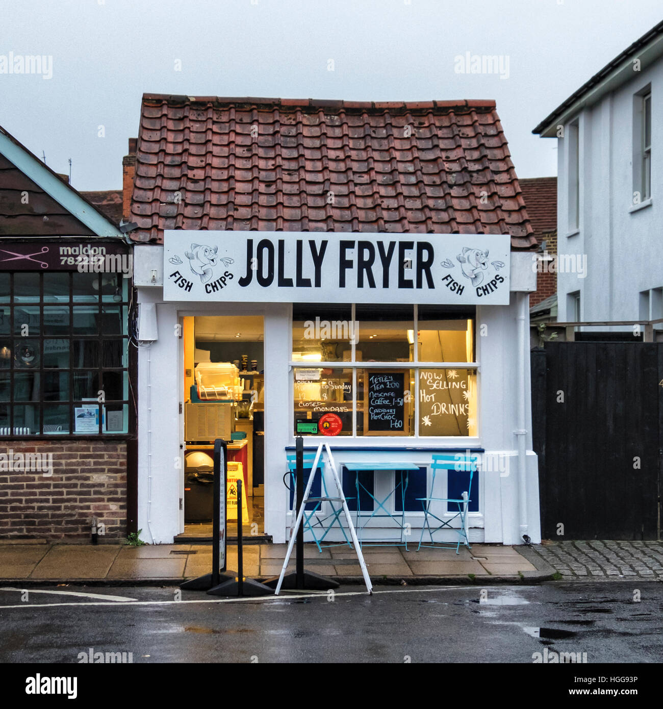 Jolly Fryer Fish and Chips take-away shop, fast food outlet, diner in old cottage building. Burnham-on-Crouch, Essex, England Stock Photo