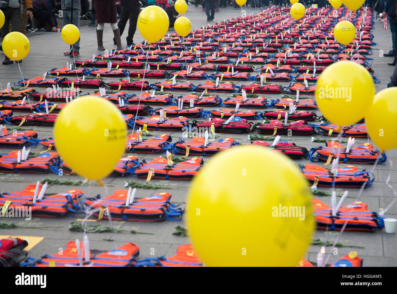 South Korea Politics, Jan 7, 2017 : Life vests are displayed to mourn over the victims of the Sewol Ferry disaster during a rally in Seoul, South Korea. About 600,000 people on Saturday participated in a rally in Seoul, held over an influence-peddling scandal centered on Park and her long-time friend Choi Soon-Sil. Park and Choi allegedly extracted US$64.7 million from conglomerates to set up private foundations controlled by Choi. People demanded President Park to step down during a rally, which was held also to mourn over the 1,000th day of the Sewol Ferry disaster on April 16, 2014, which f Stock Photo