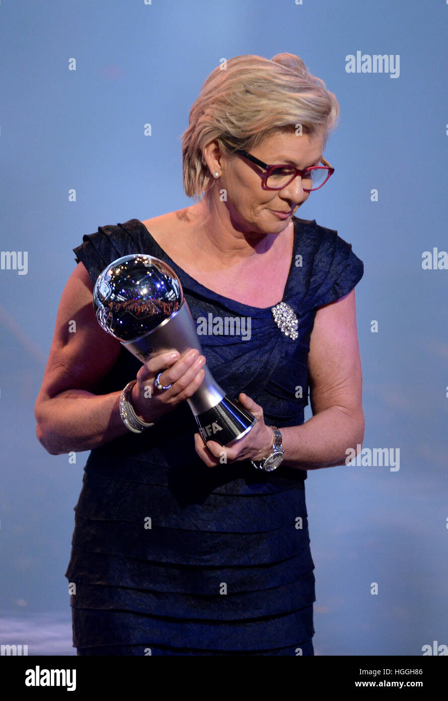 Zurich, Switzerland. 9th Jan, 2017. Silvia Neid, former coach of the German national soccer team, receives her trophy as Best FIFA Women's Coach at the FIFA World Player of the Year 2016 gala event in Zurich, Switzerland, 9 January 2017. Former Brazilian soccer player Ronaldo can be seen on the right. Photo: Patrick Seeger/dpa/Alamy Live News Stock Photo