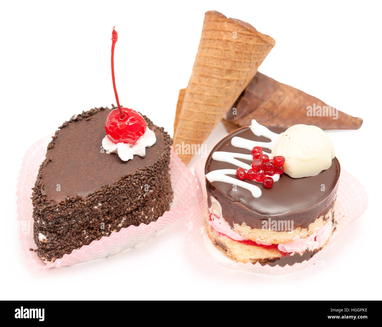 dessert chocolate cakes and waffle cones on a white Stock Photo Alamy
