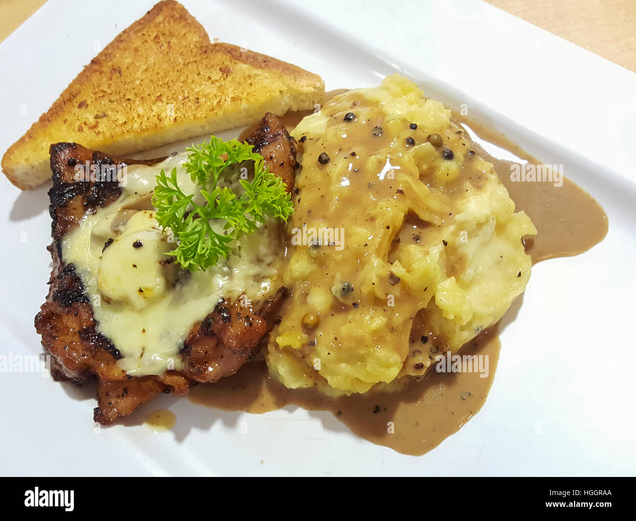 Steak chicken champignon mushroom sauce served with mashed potato Stock  Photo - Alamy