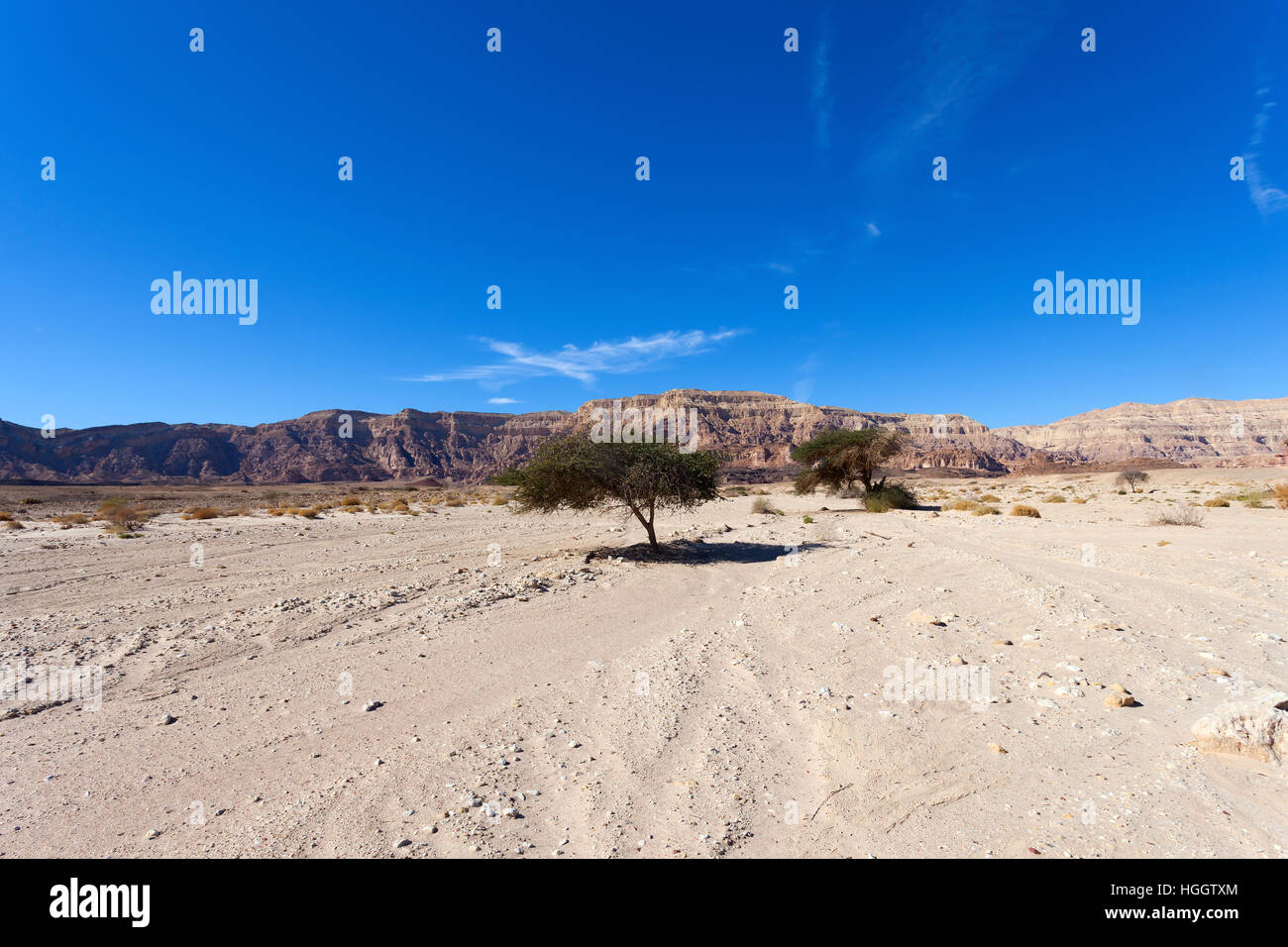 Desert mountains with blue sky in the background Stock Photo - Alamy