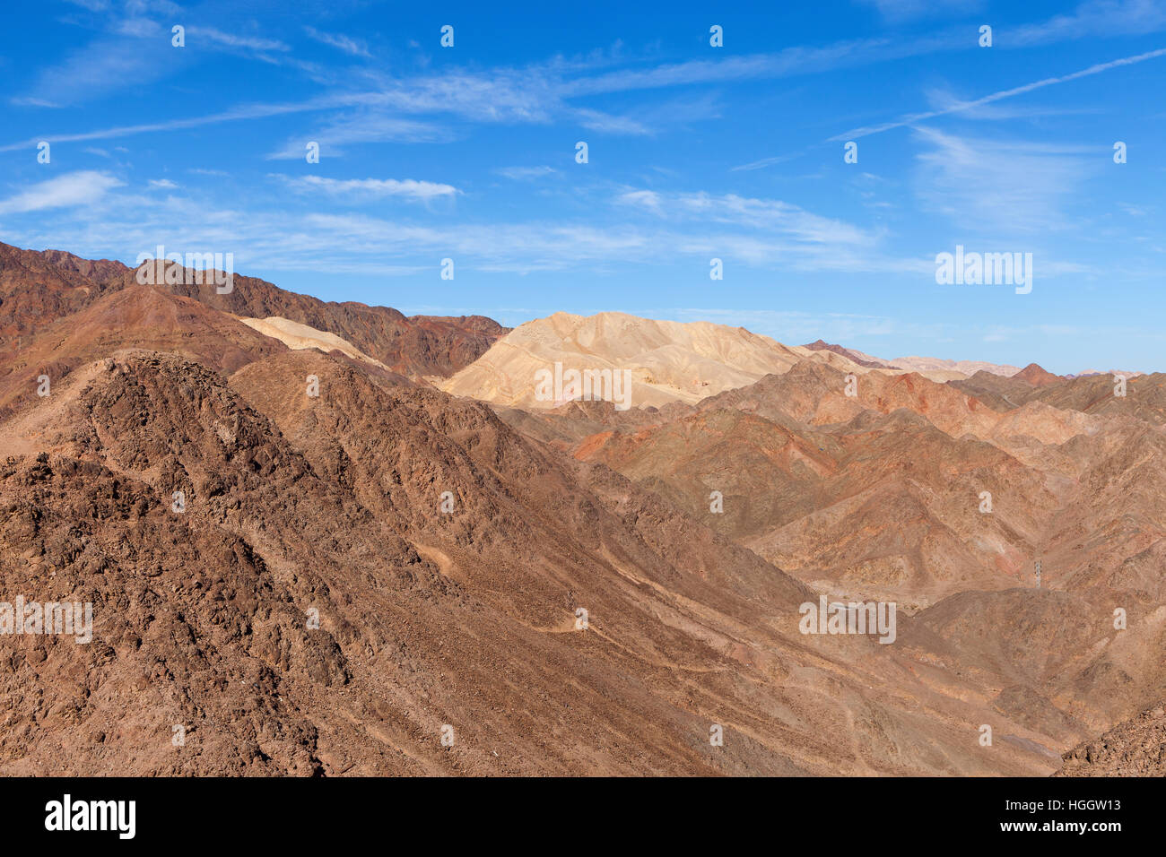 Desert mountains with blue sky in the background Stock Photo - Alamy