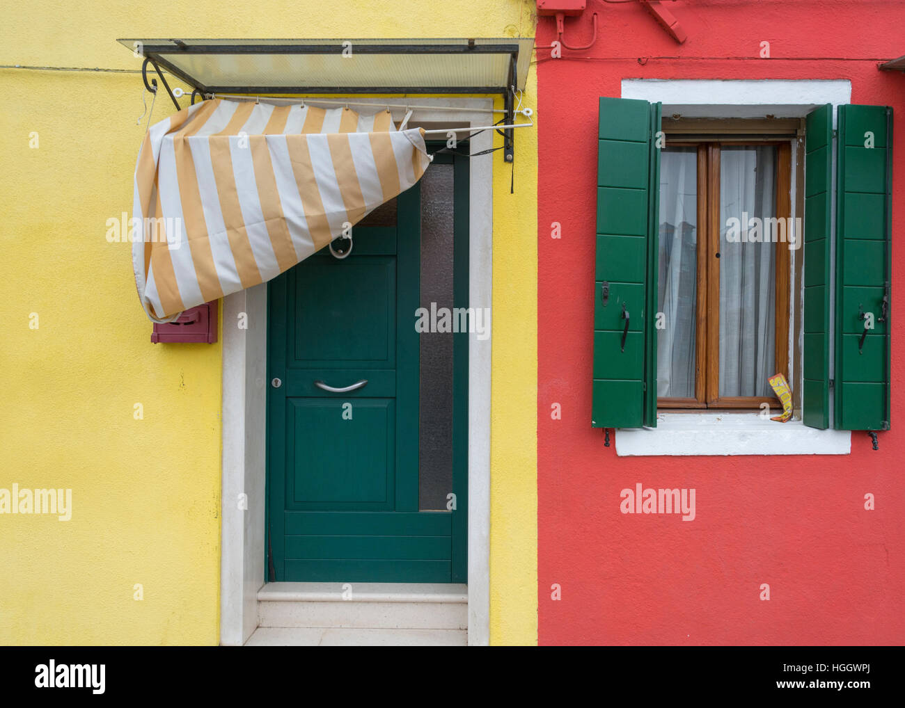 Colourful doorway and window on Burano, Venice, Italy Stock Photo
