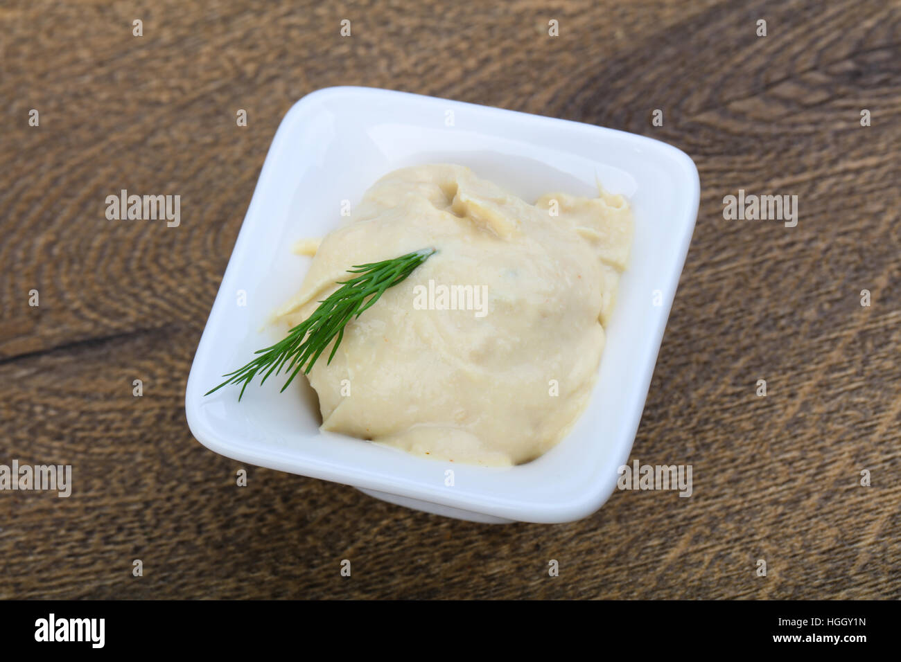 Arabic traditional cusine hummus with dill and cedar nuts Stock Photo