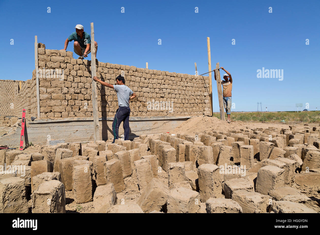 Construction work with mud bricks in Shymkent, Kazakhstan. Stock Photo