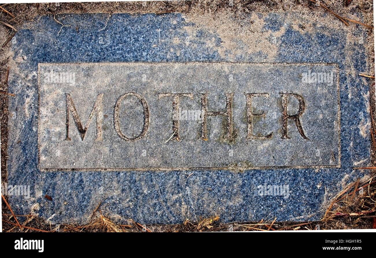 Tomball, TX USA - Dec. 27, 2016  -  This cemetery is a TX Landmark and was open in 1873.  There are four grave marker that read PAPA, MAMA, FATHER & Stock Photo