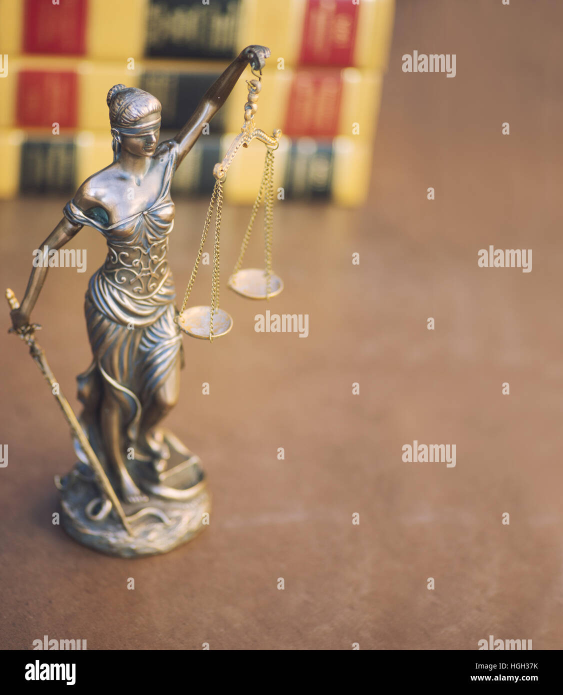 Legal law concept image, scales of justice with books in background Stock Photo