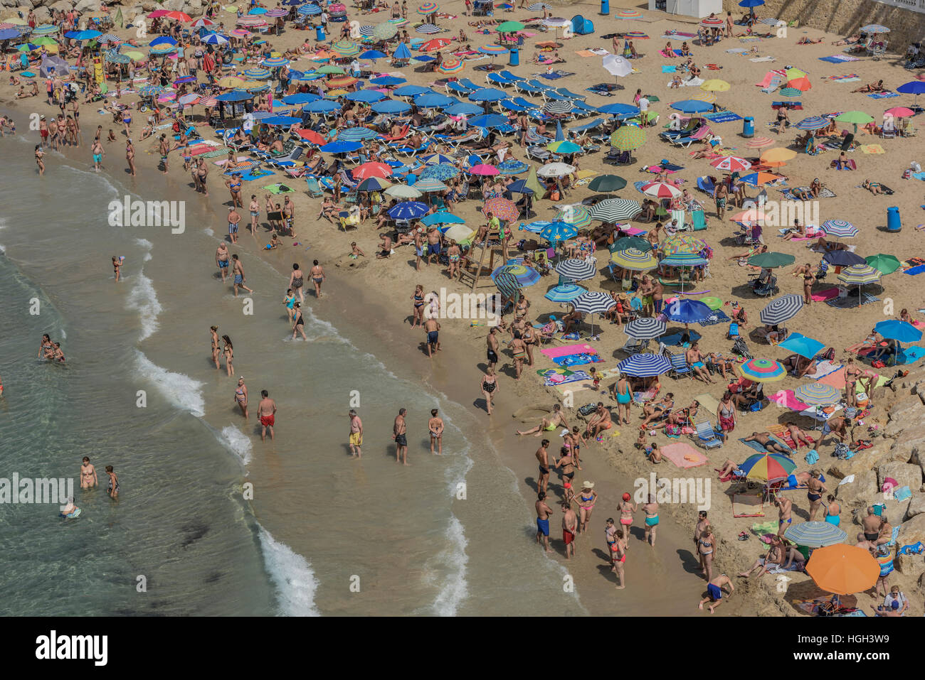 Tourists at the Playa Mal Pas, Benidorm, Province of Alicante, Costa Blanca, Spain Stock Photo