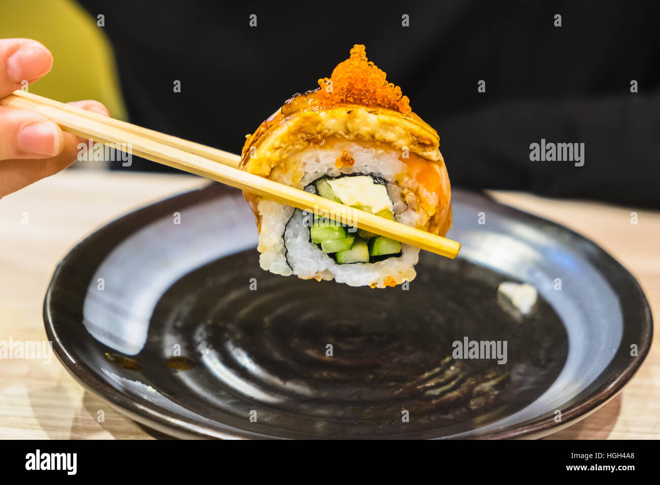 sushi roll with chopstick Stock Photo
