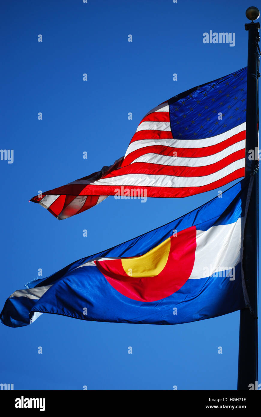 Colorado State Flag Waving in Wind with US Flag Stock Photo