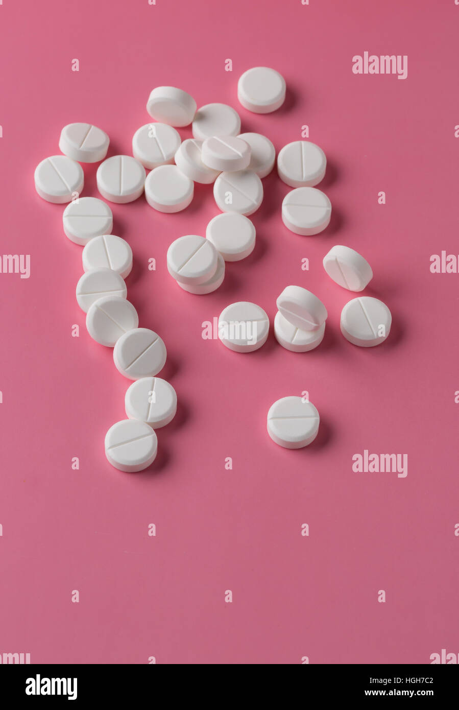 Heap of round white pills Stock Photo