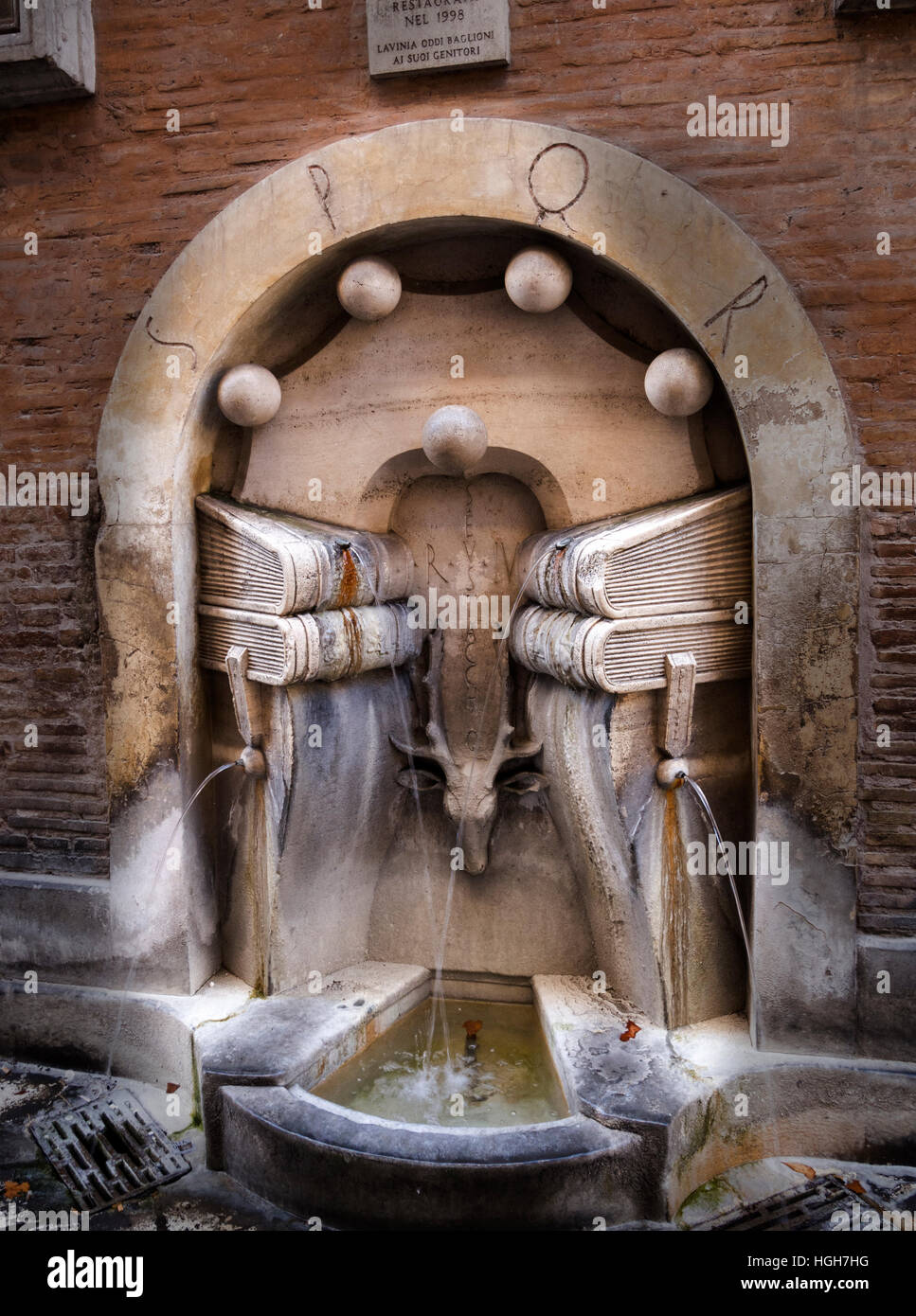 Deer Rome Fountain in Rome at the site of the old university with books and deer ...