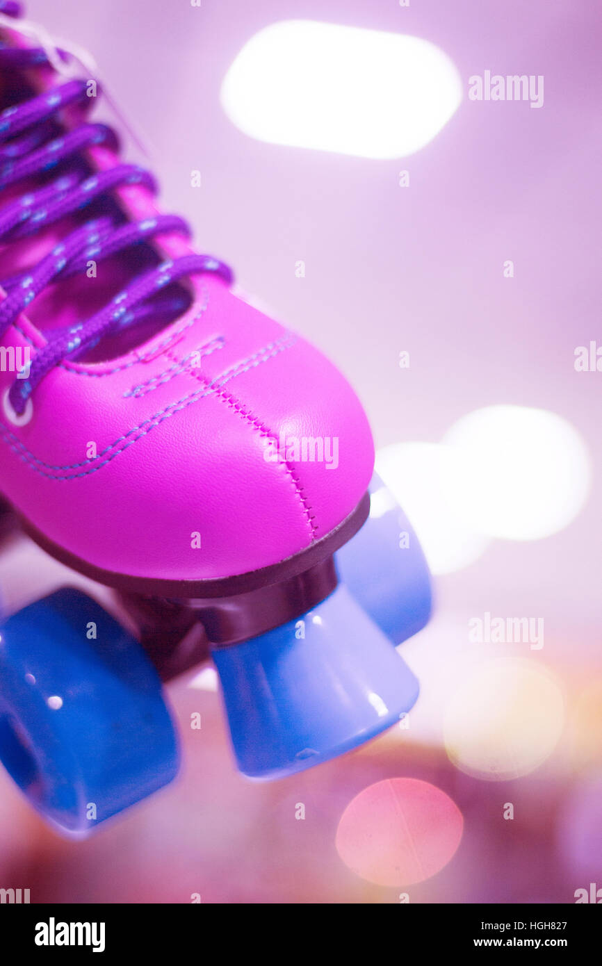 Childrens quad skate rollerskates in skate store in shop window display