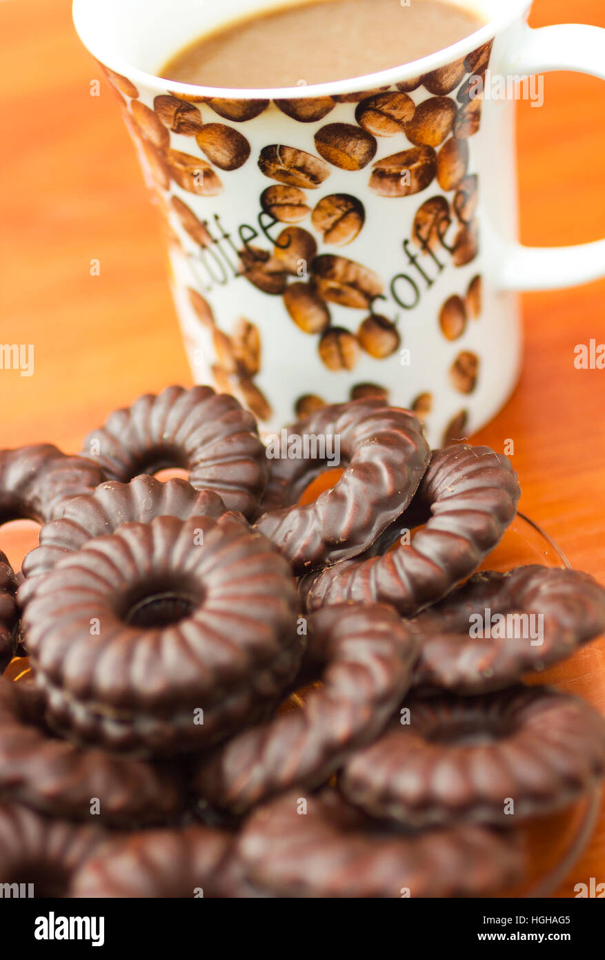 Coffee and chocolate biscuits closeup Stock Photo Alamy