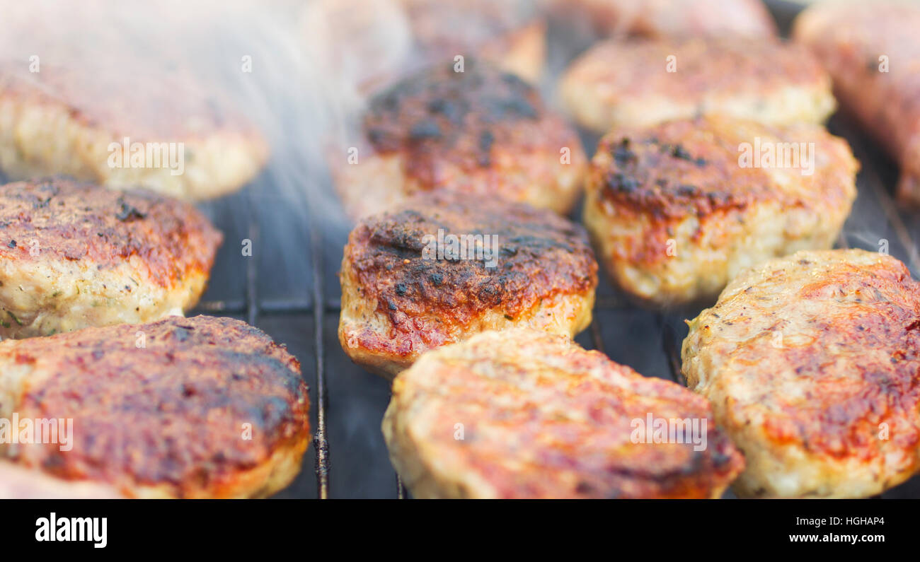 Grilled meat on barbecue Stock Photo - Alamy
