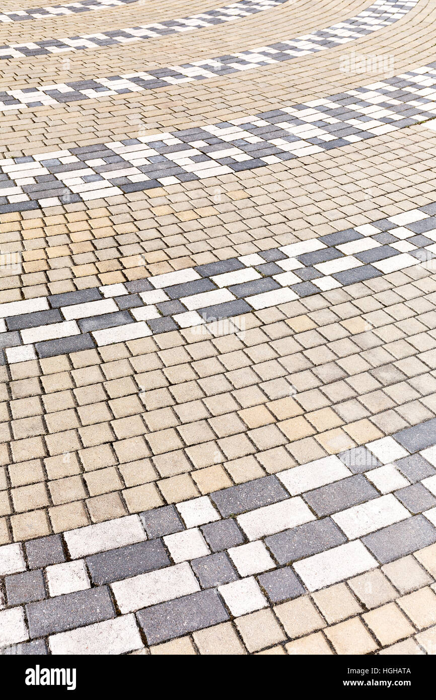 Different colored concrete bricks of pavement background Stock Photo