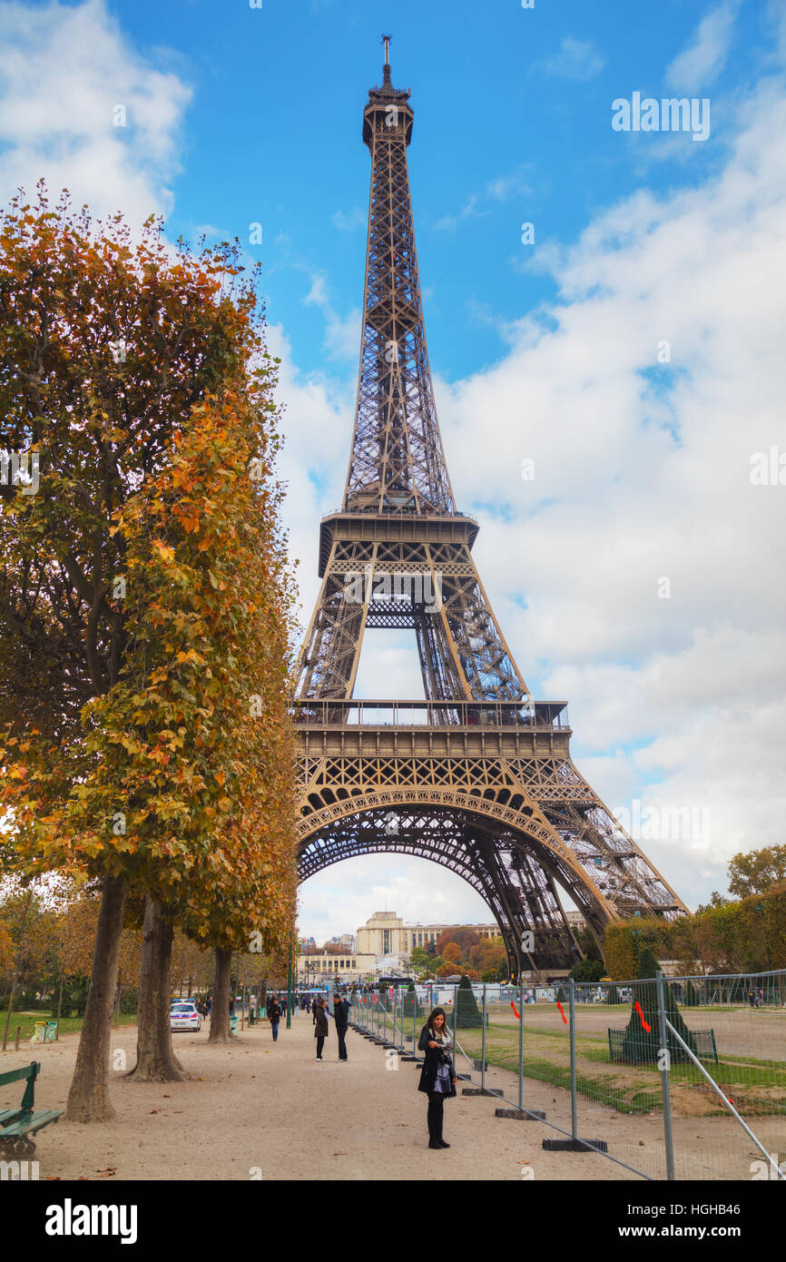 PARIS NOVEMBER 2 Eiffel tower surrounded by tourists on November 2, 2016 in Paris, France