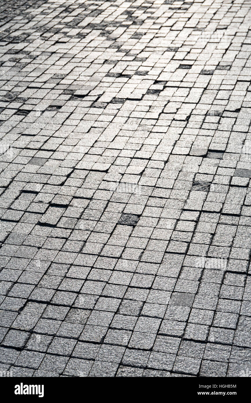 Grey granite cobblestone pavement texture as background Stock Photo - Alamy
