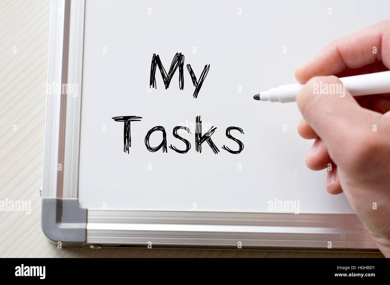 Human hand writing my tasks on whiteboard Stock Photo Alamy