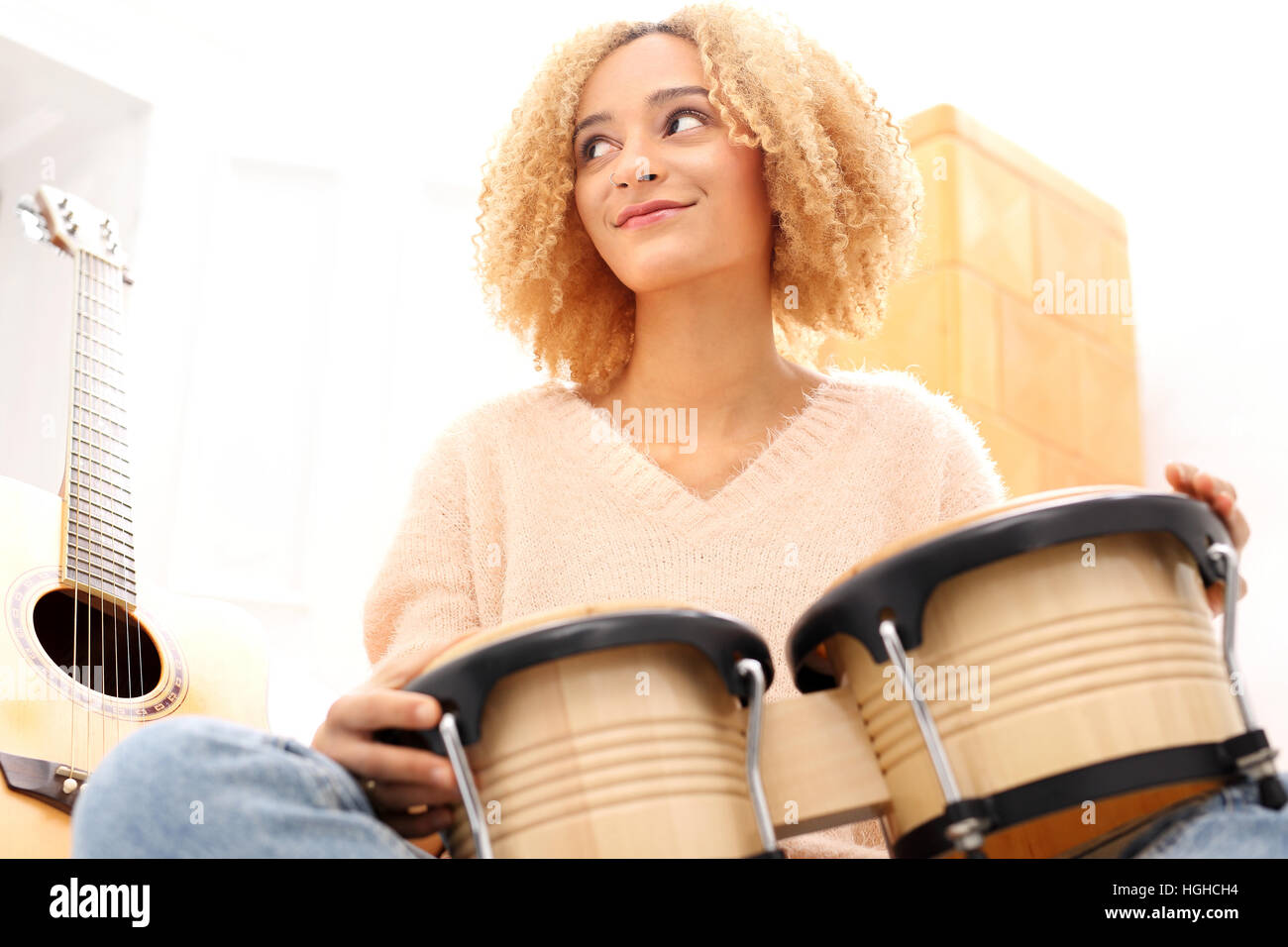 Music. Create your own music. Tapping the rhythm on the drums. Bongos