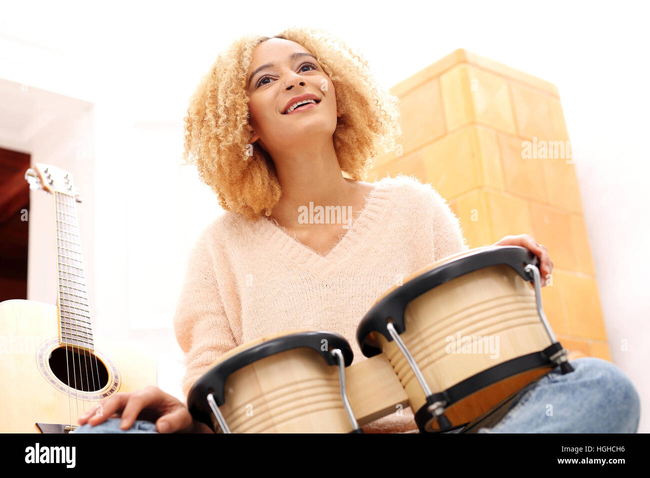 Playing the bongos hires stock photography and images Alamy